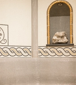 A decorative wall niche with salt crystals in the sauna area.
